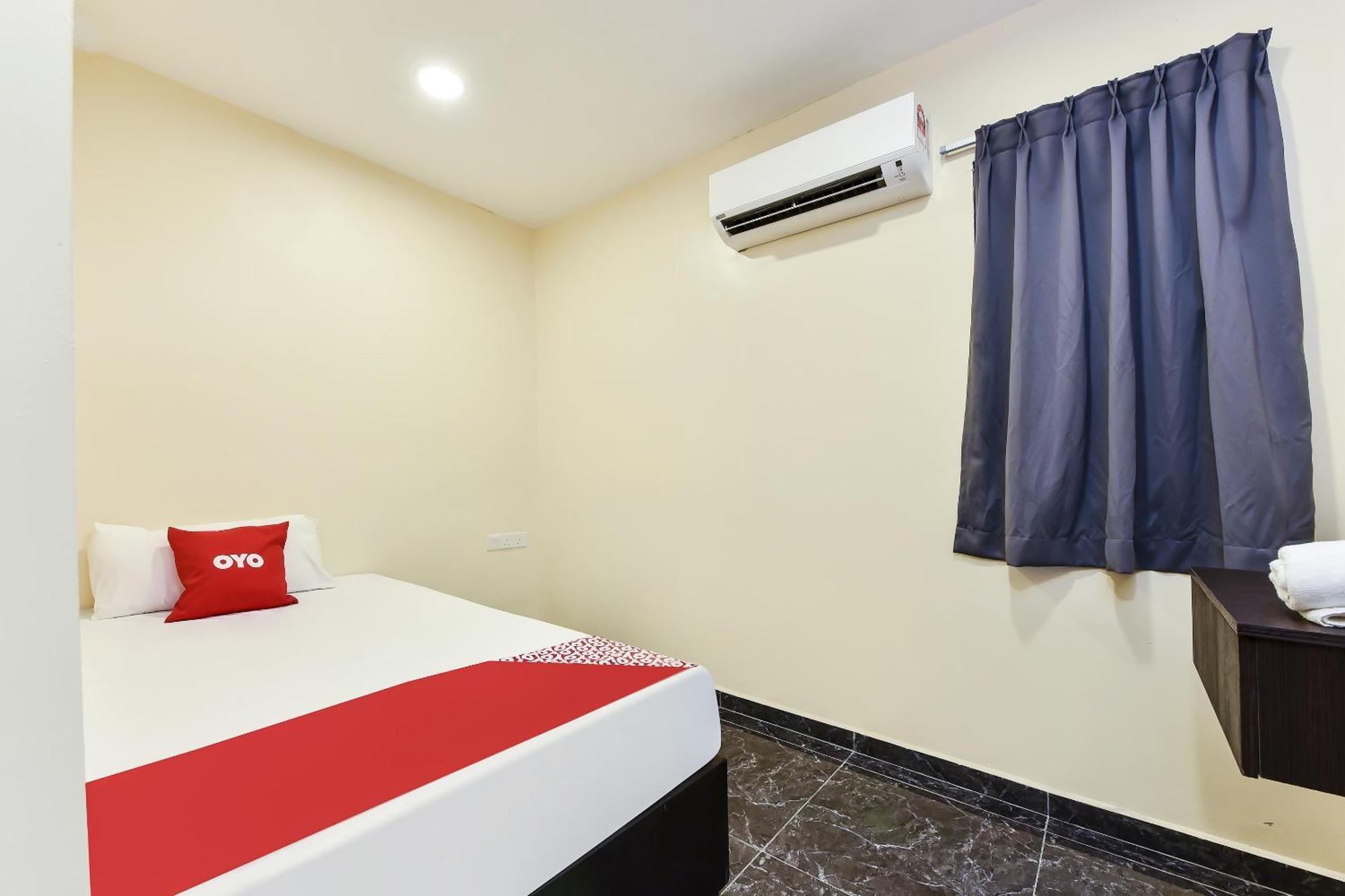 Oyo 90445 Th Hotel Bahau Dış mekan fotoğraf