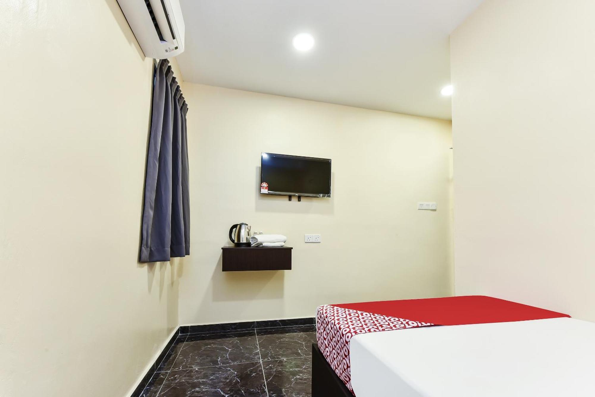 Oyo 90445 Th Hotel Bahau Dış mekan fotoğraf